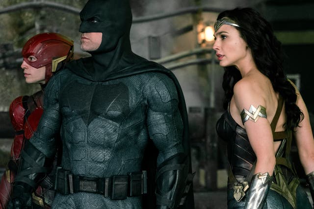 <p>Holding out for a hero: Ezra Miller as The Flash, Ben Affleck as Batman and Gal Gadot as Wonder Woman</p>