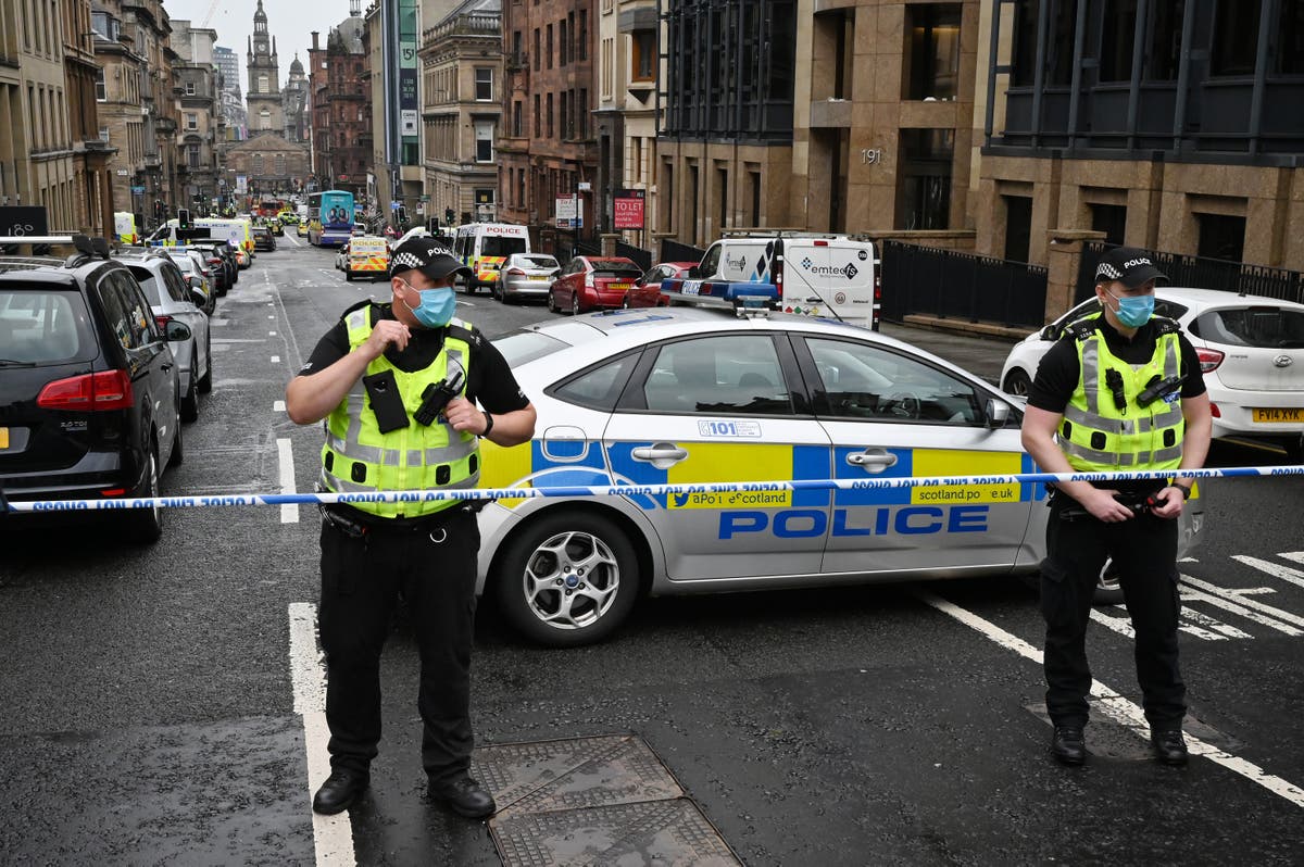 Teenager arrested after three men stabbed at Glasgow football pitch