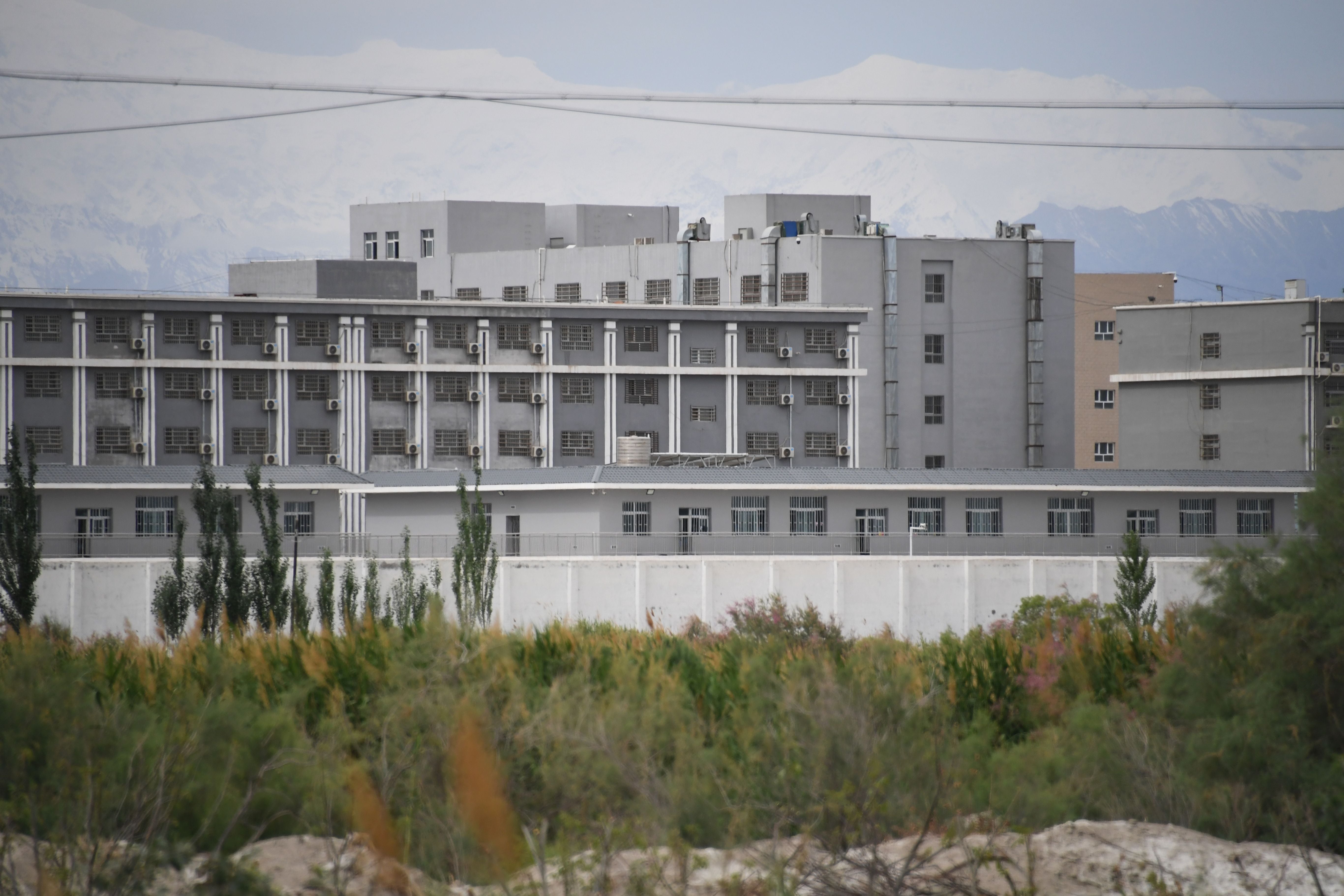 File Image: This photo taken on 4 June 2019 shows a facility believed to be a re-education camp where mostly Muslim ethnic minorities are detained, north of Akto in China's northwestern Xinjiang region
