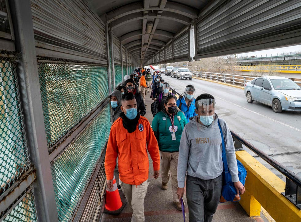 <p>Migrants crossing into the US from Mexico</p>