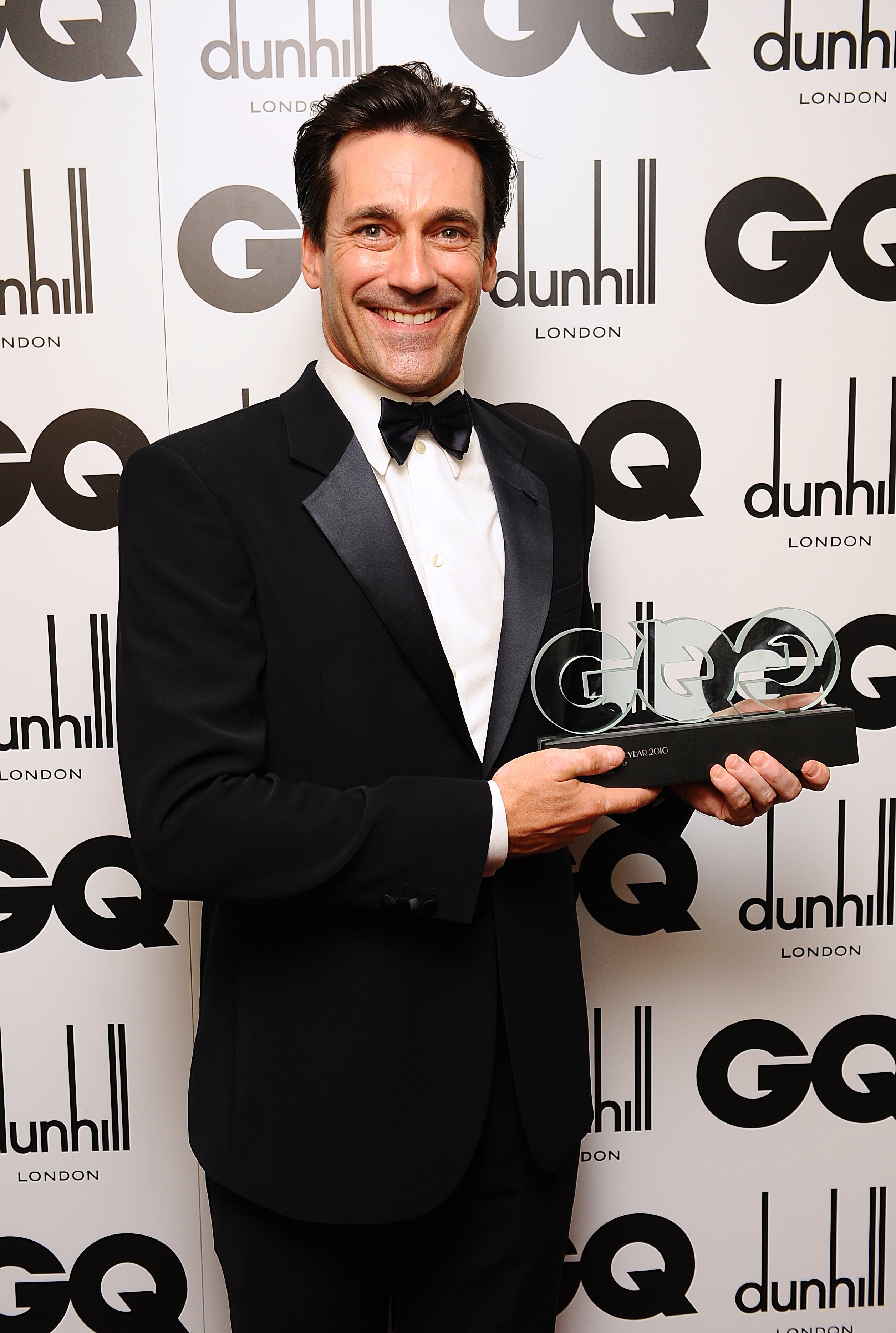 Jon Hamm with his Man of The Year Award, at the 2010 GQ Men of the Year Awards 2010