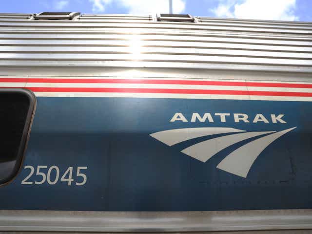  An Amtrak train is seen as people board at the Miami station on 24 May, 2017 in Miami, Florida
