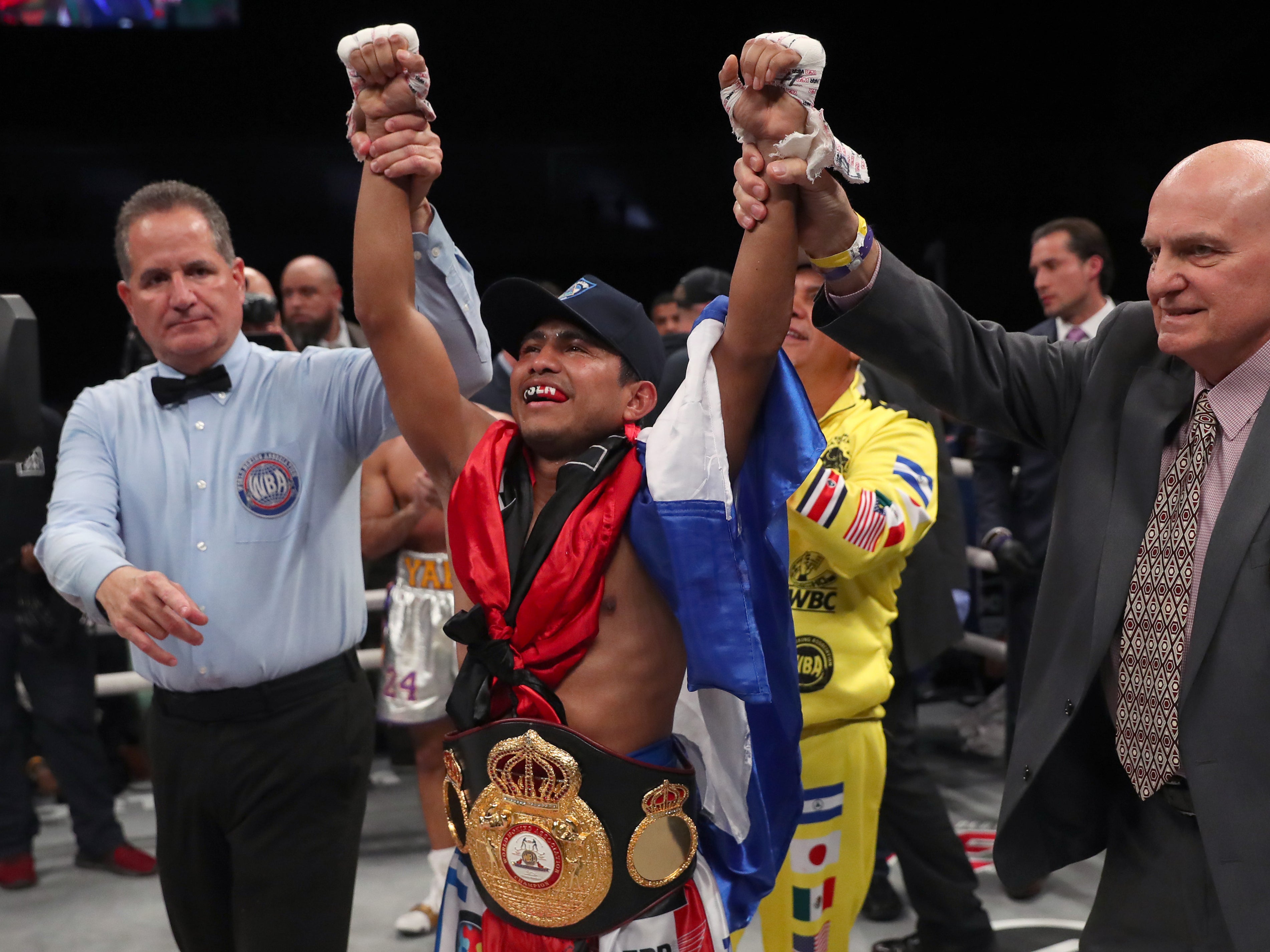 Roman Gonzalez celebrates after beating Khalid Yafai