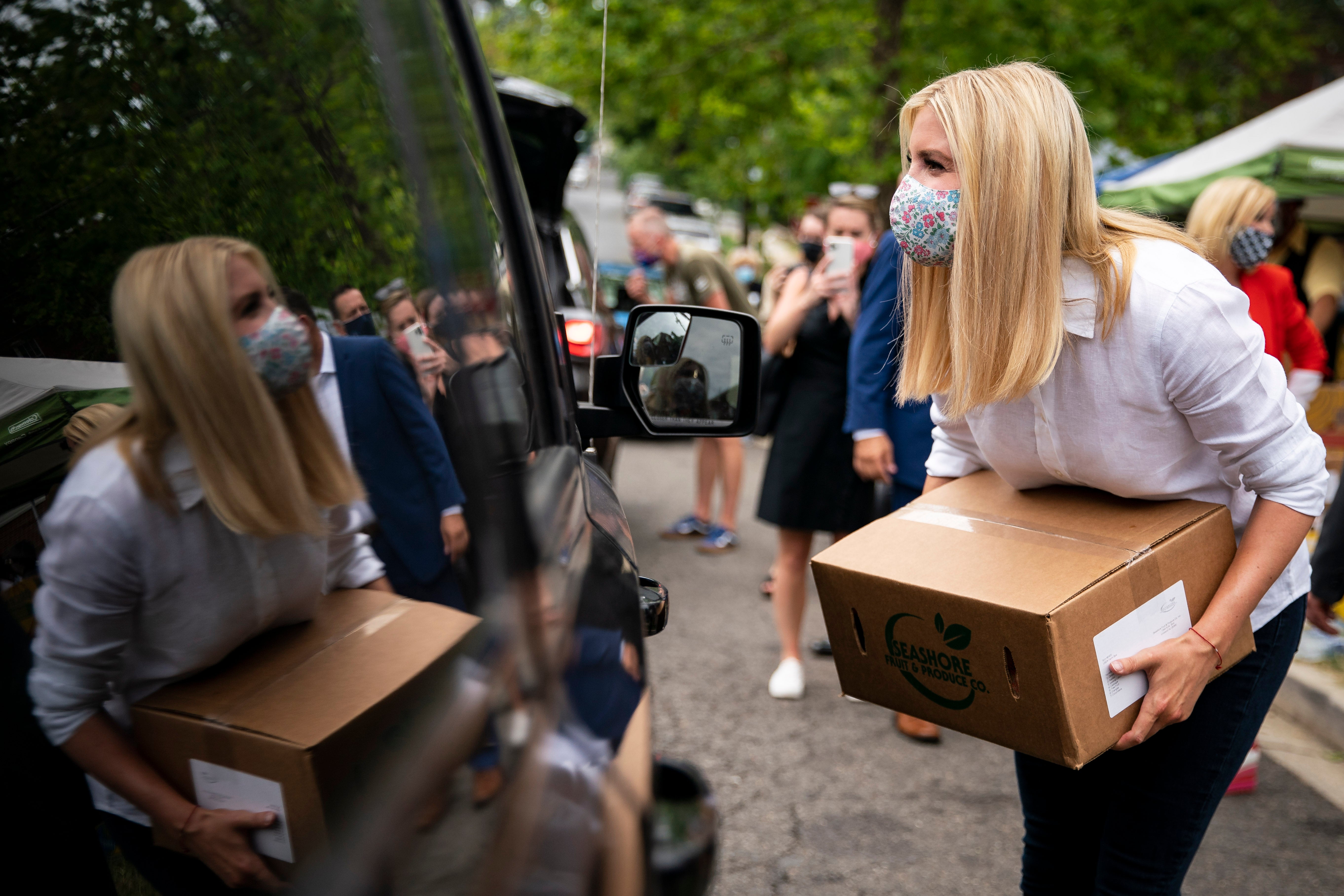 Ivanka Trump helps distribute food boxes as part of the Farmers to Families food box programme, at the DC Dream Center, on 20 July, 2020 in Washington, DC