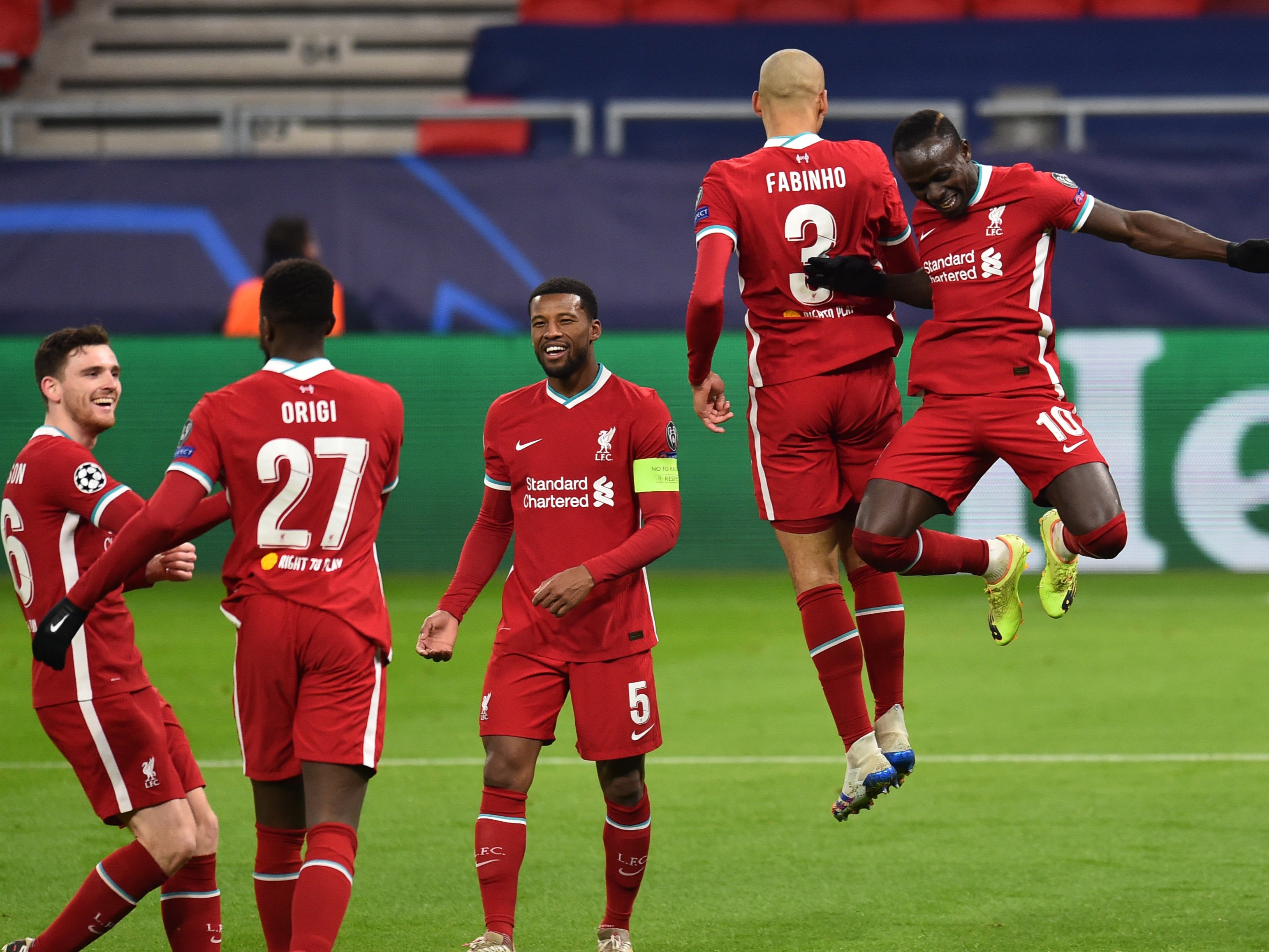 Liverpool players celebrate Sadio Mane’s (right) goal