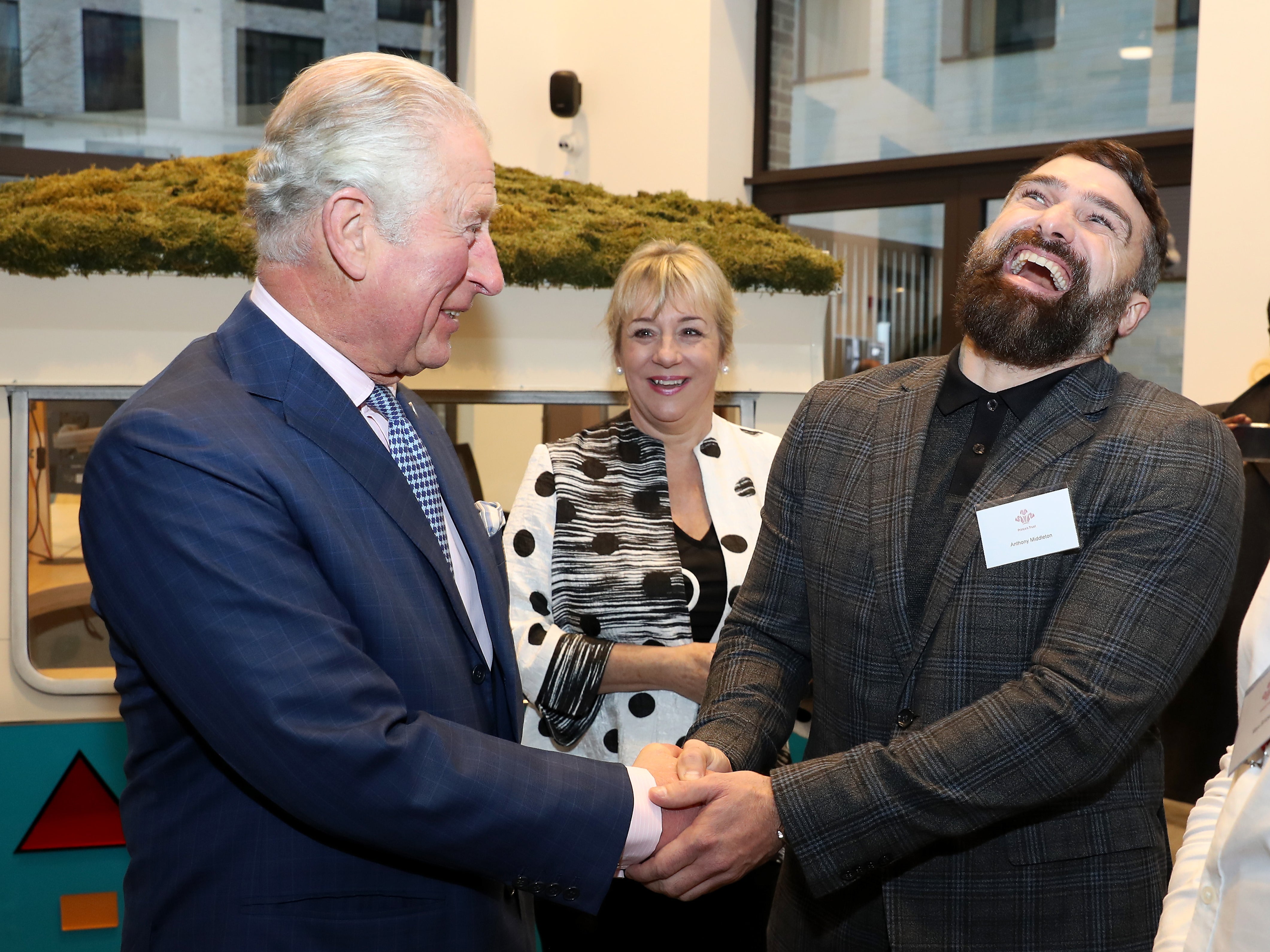 Middleton laughing with Prince Charles during the opening of the Prince’s Trust’s South London Centre in December 2019