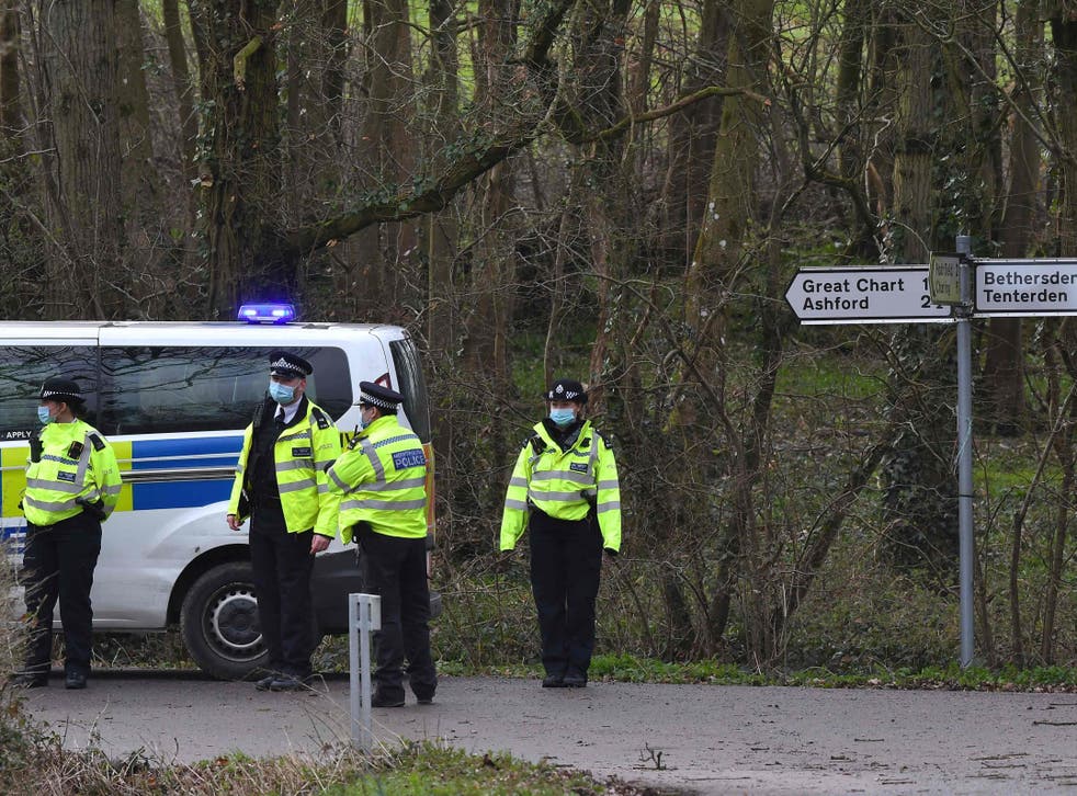 Police stand guard near Great Chart Golf and Leisure, near Ashford in Kent