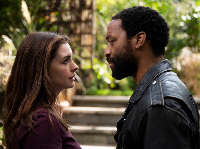 <p>Partners in crime: Linda (Anne Hathaway) and her ex-husband Paxton (Chiwetel Ejiofor)</p>