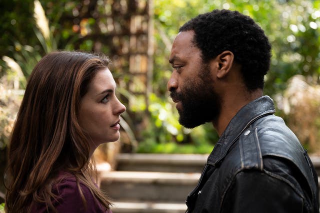 <p>Partners in crime: Linda (Anne Hathaway) and her ex-husband Paxton (Chiwetel Ejiofor)</p>