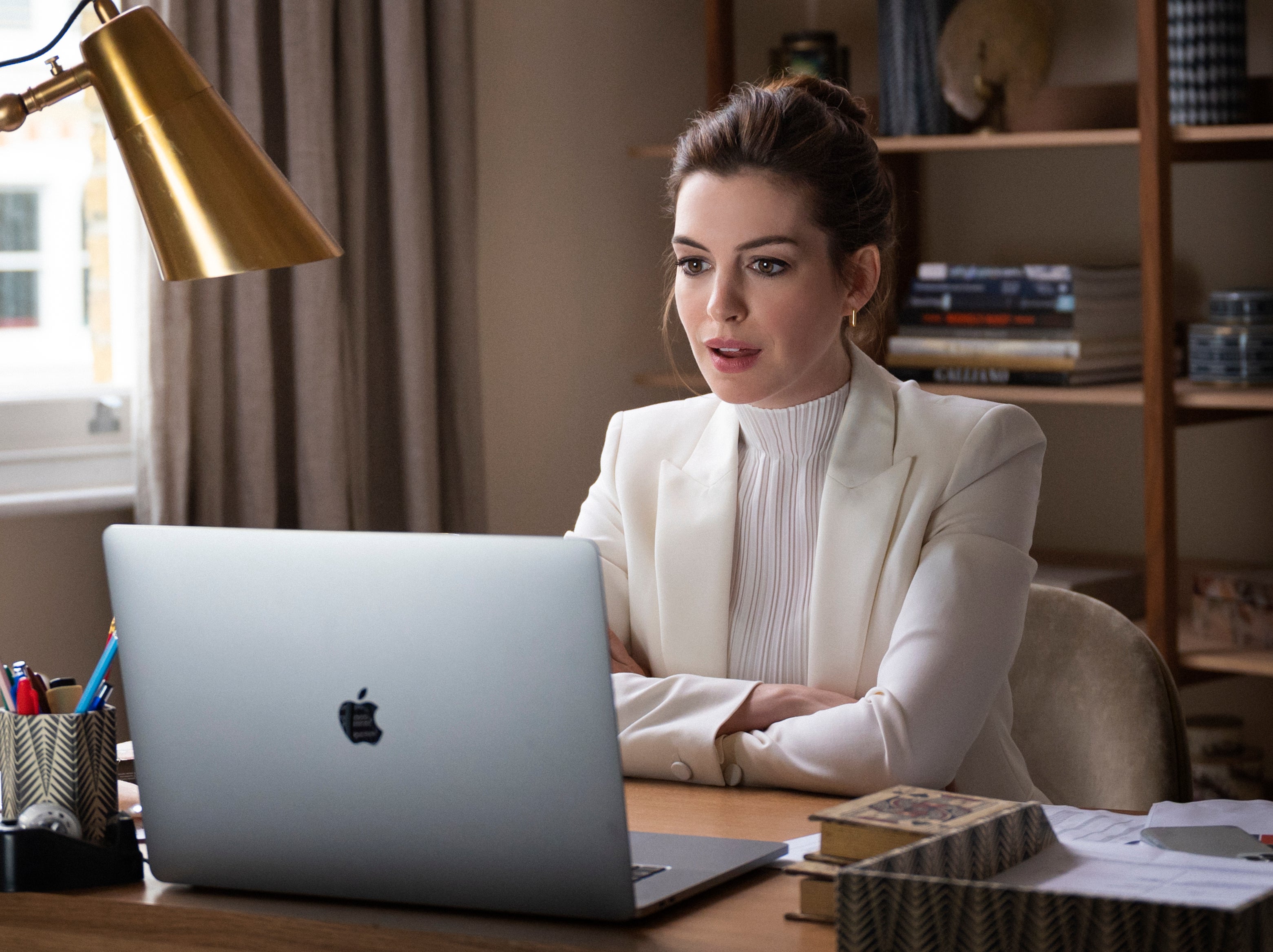 Anne Hathaway’s Linda is a strained executive for a high-fashion brand who has a moral awakening