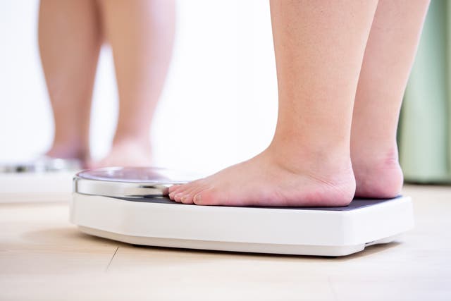 Two teenage children have been taken into foster care in Sussex after their parents failed to get them to lose weight