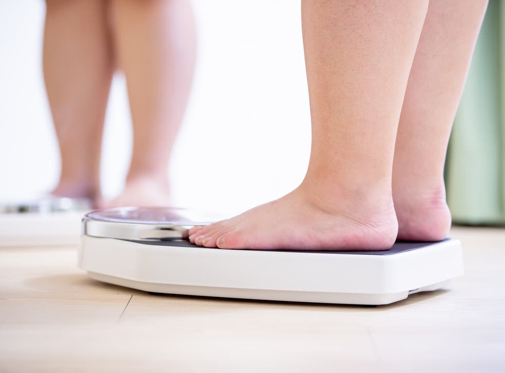 Two teenage children have been taken into foster care in Sussex after their parents failed to get them to lose weight