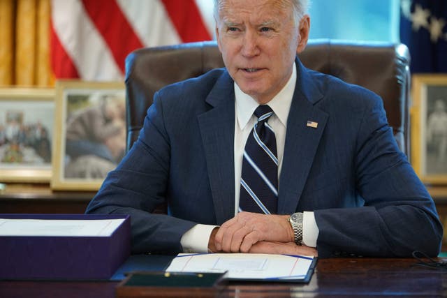 <p>President Biden signs the American Rescue Plan on Thursday, in the Oval Office of the White House in Washington, DC</p>