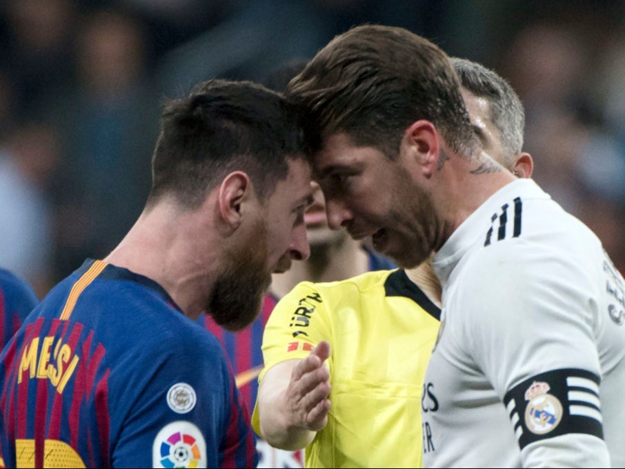 Lionel Messi and Sergio Ramos square up during El Clasico