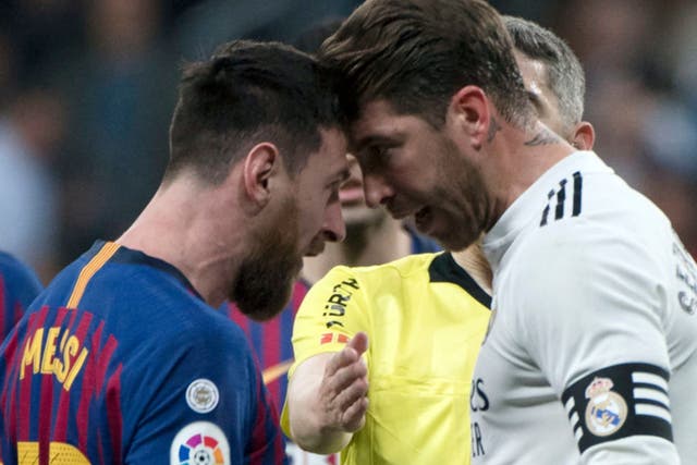 Lionel Messi and Sergio Ramos square up during El Clasico