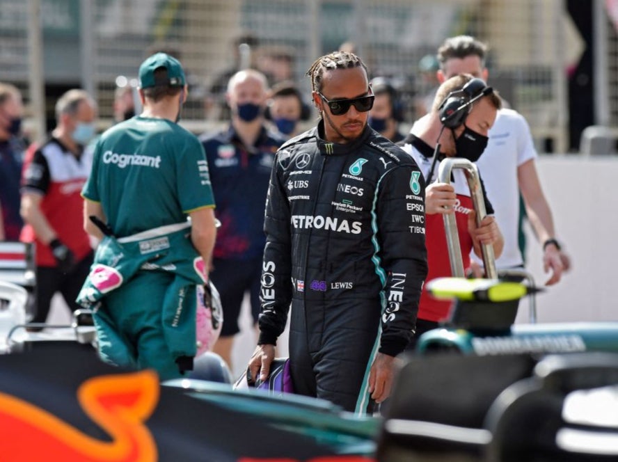 Lewis Hamilton looks on during testing