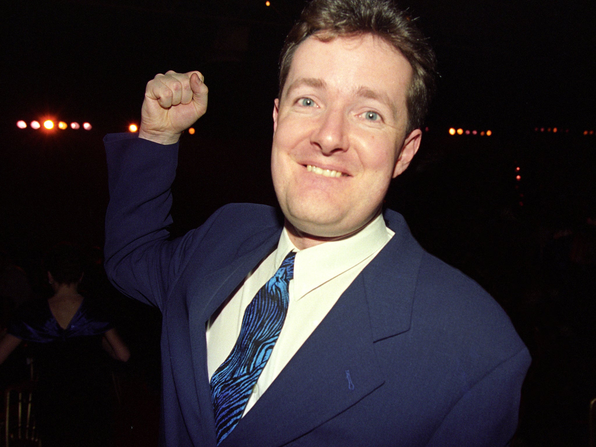 <p>One-man outrage: Piers Morgan takes aim while attending the 1994 Brit Awards</p>