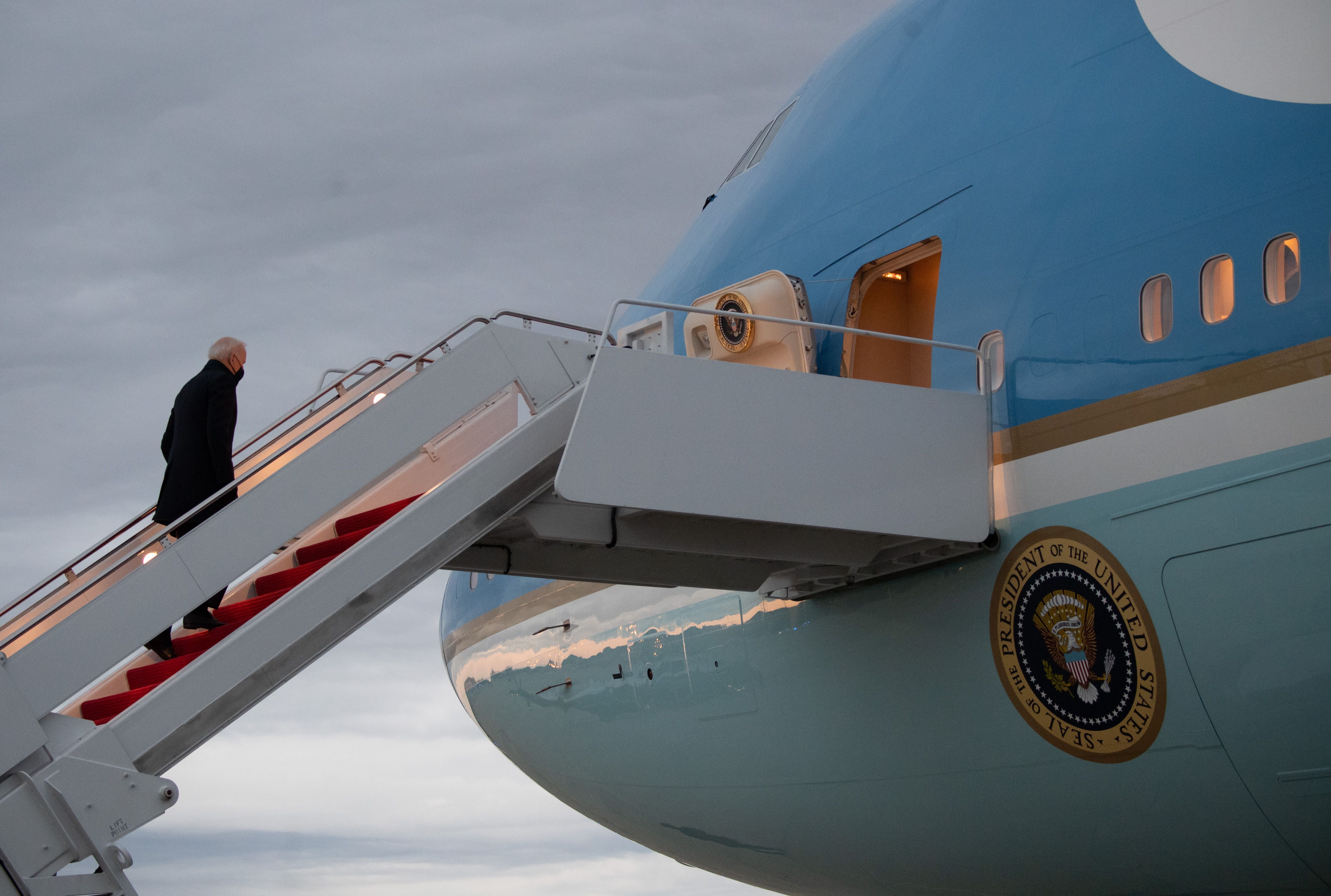 President Joe Biden (not the intruder) boards Air Force One on 16 February