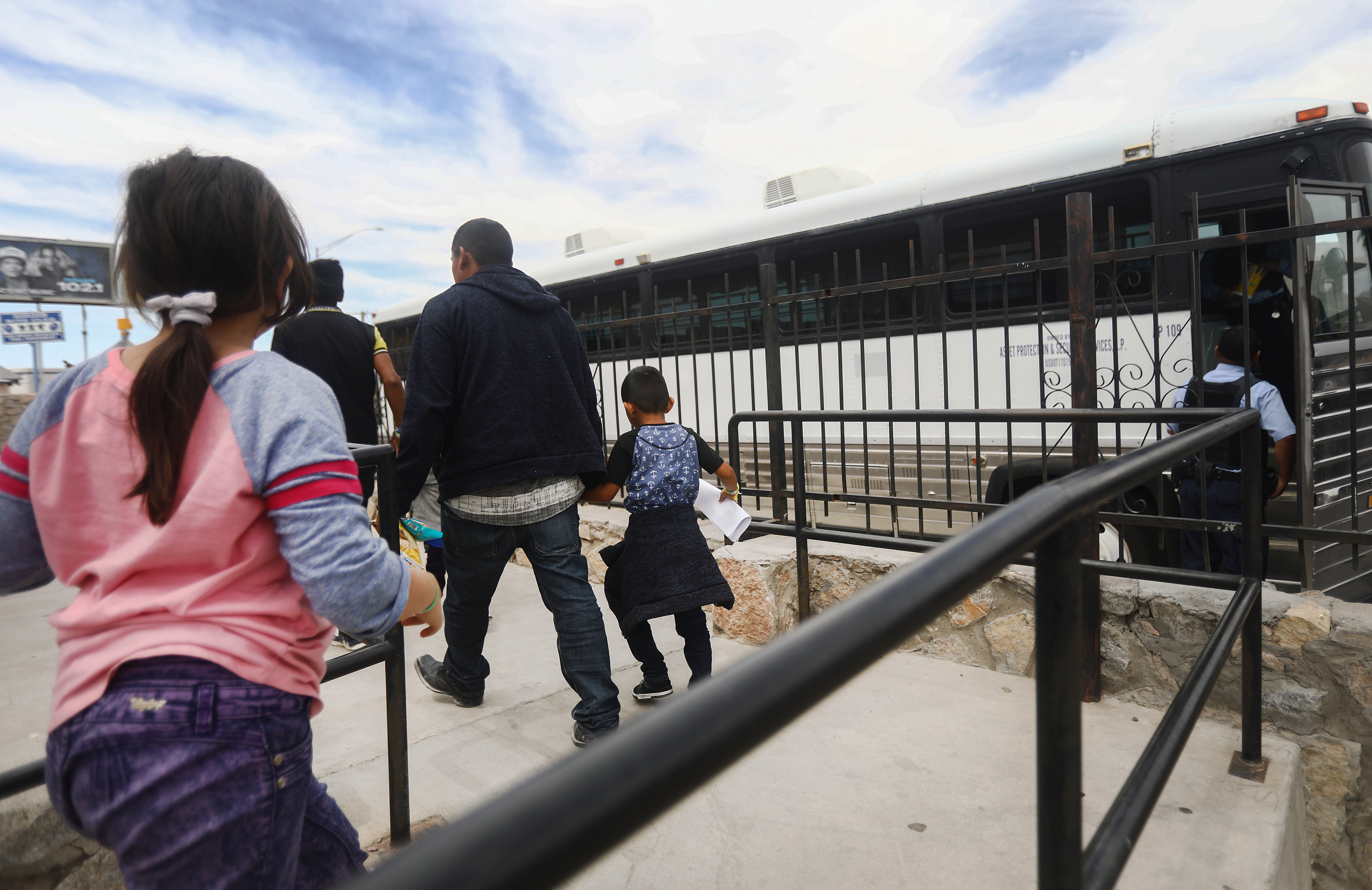 Migrants are dropped off at a church serving as a shelter for migrants who are seeking asylum, after they were released by ICE, on May 19, 2019 in El Paso, Texas.