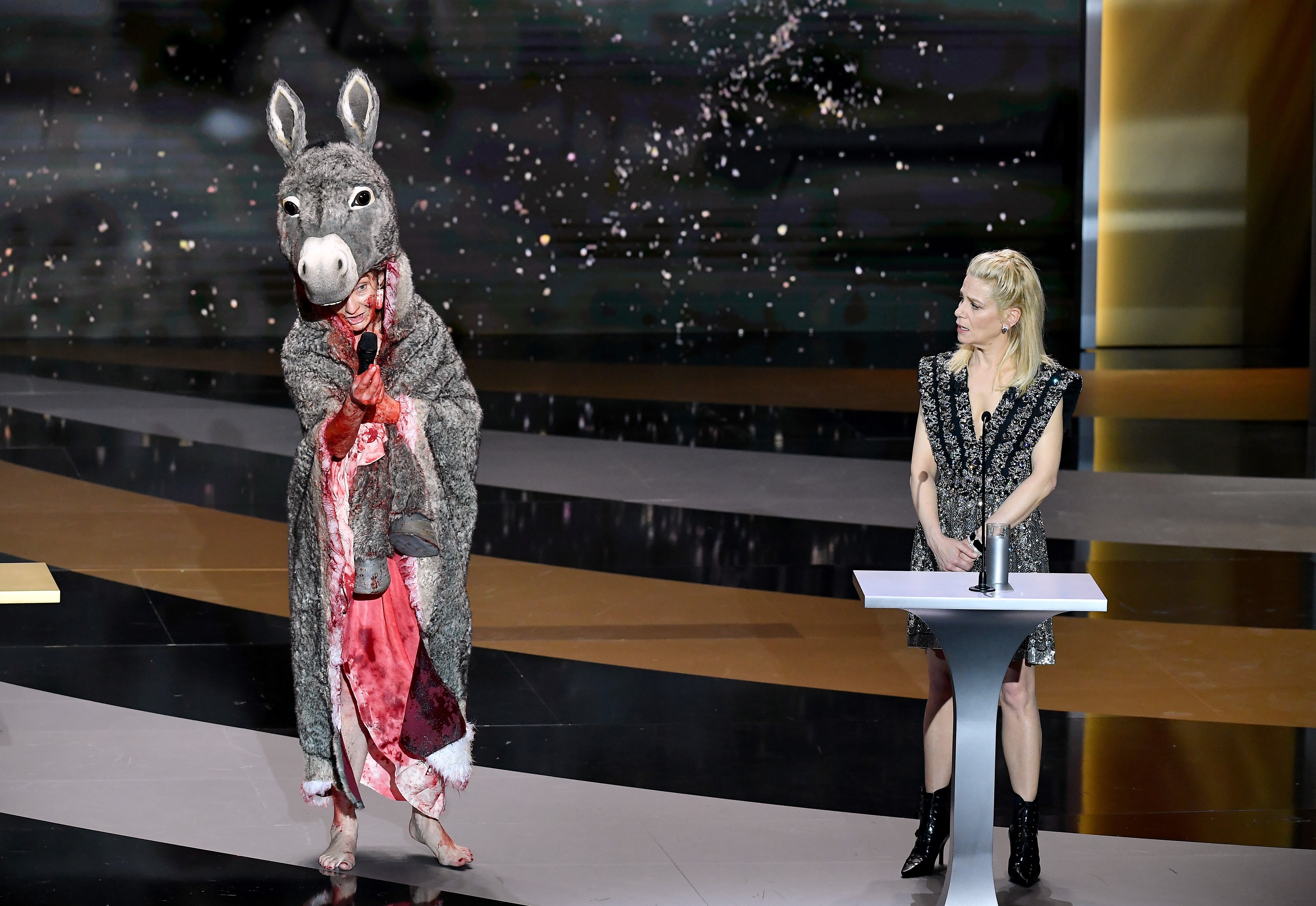 Masiero appeared on stage dressed as a donkey during the televised event