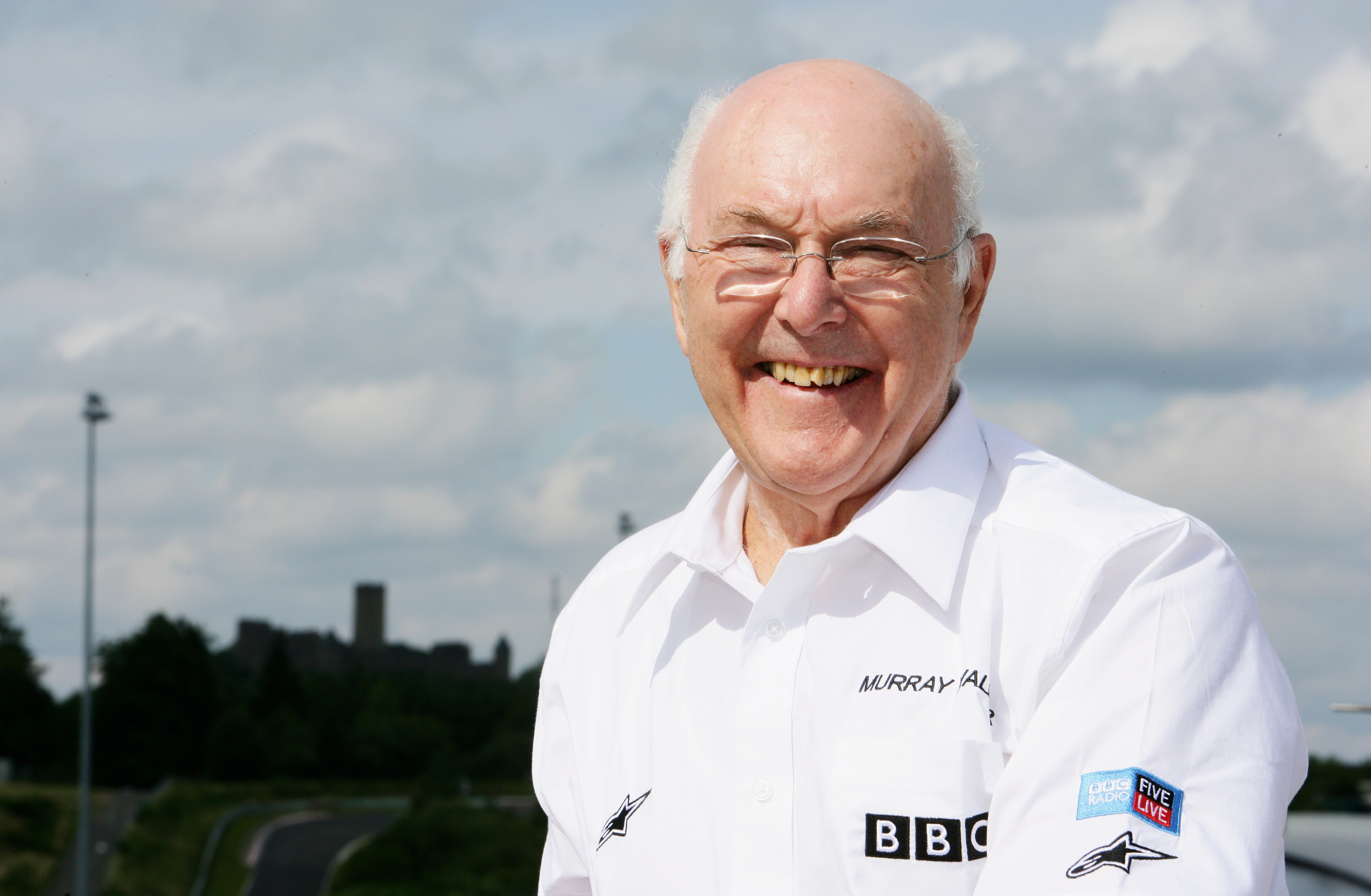 Formula One commentator Murray Walker poses during practice for the European Grand Prix at Nurburgring