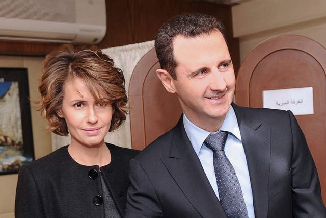Syrian President Bashar al-Assad and his wife Asma in Damascus in 2012