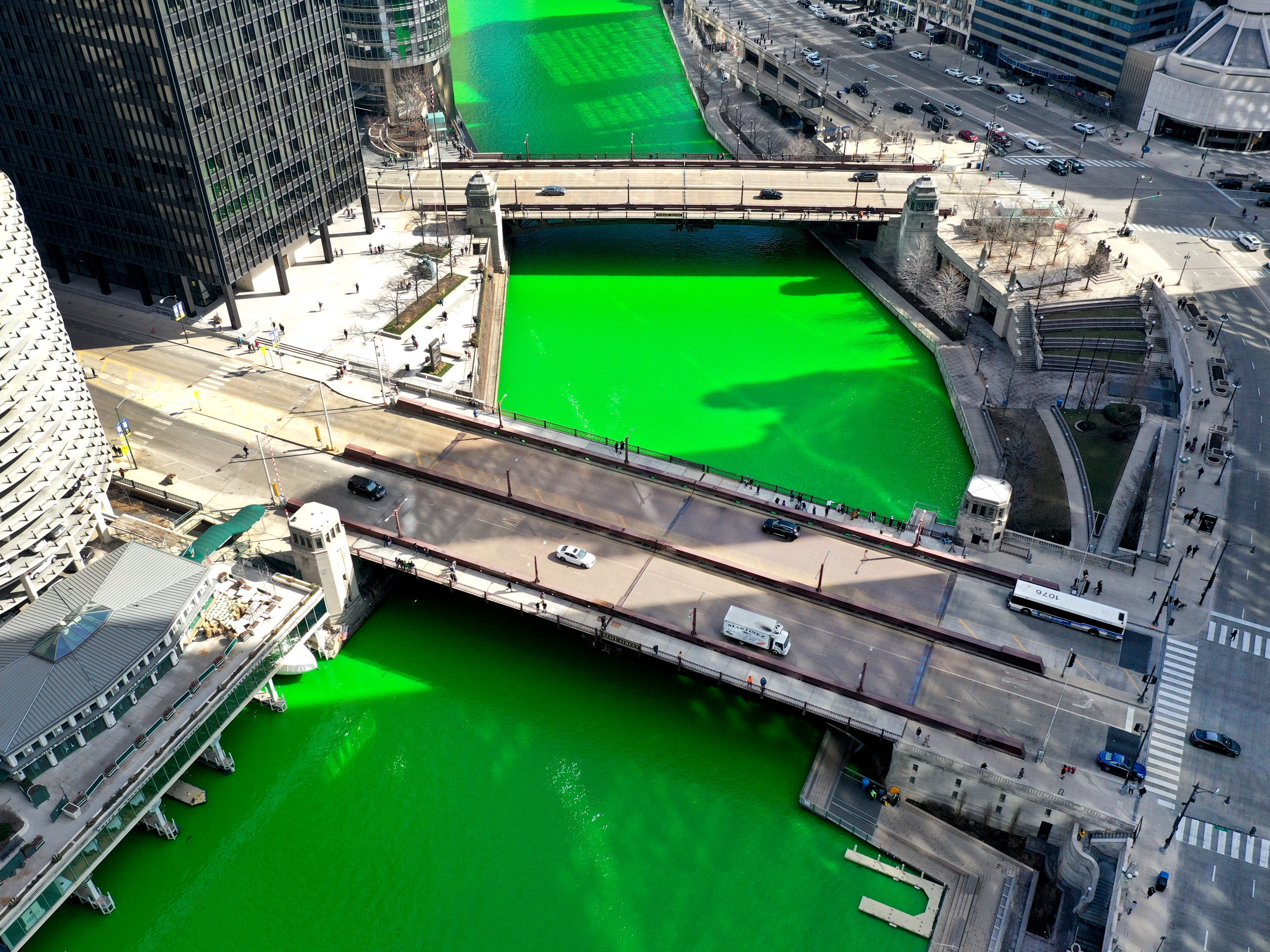 <p>The Chicago River flows through downtown after it was dyed green in celebration of St Patrick’s Day on 13 March, 2021 in Chicago, Illinois</p>