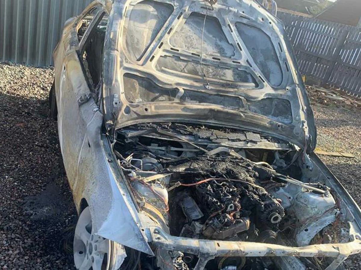 Cars set alight and daubed with racist graffiti in hate crime attack