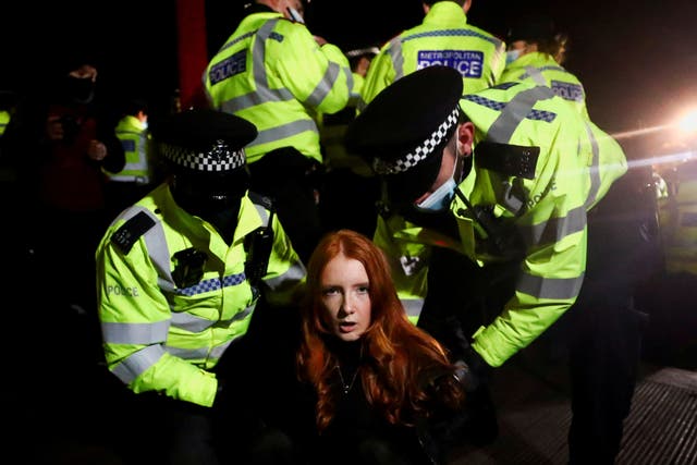 <p>Face of defiance: Patsy Stevenson is arrested at the Sarah Everard memorial site Clapham Common</p>