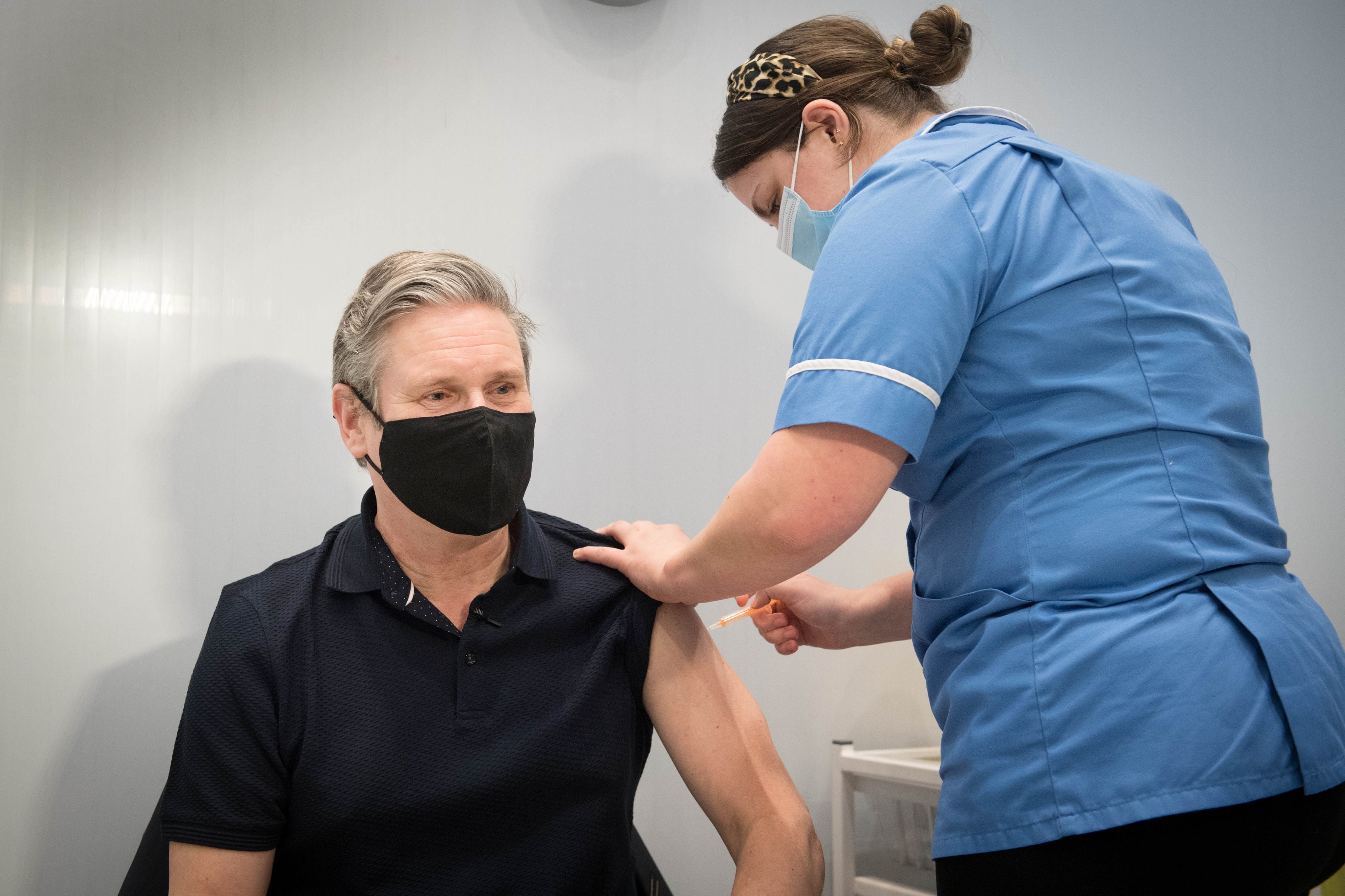 Sir Keir receives his first dose of the coronavirus vaccine from midwife Emily Malden at the Francis Crick Institute in his Holborn and St Pancras constituency