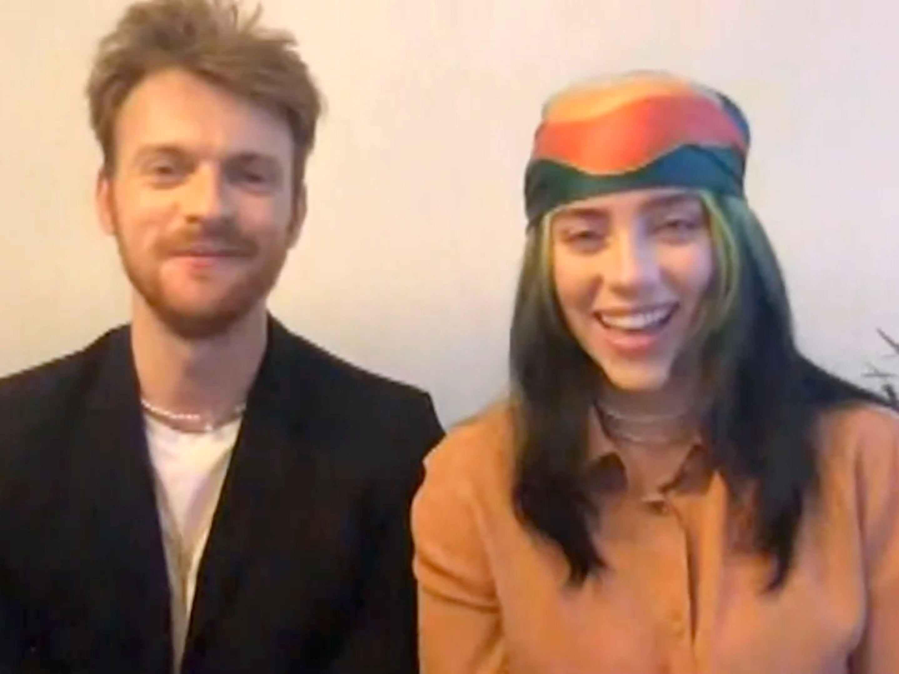 Finneas and Billie Eilish accept the Grammy for Best Song Written for Visual Media award for ‘No Time to Die’