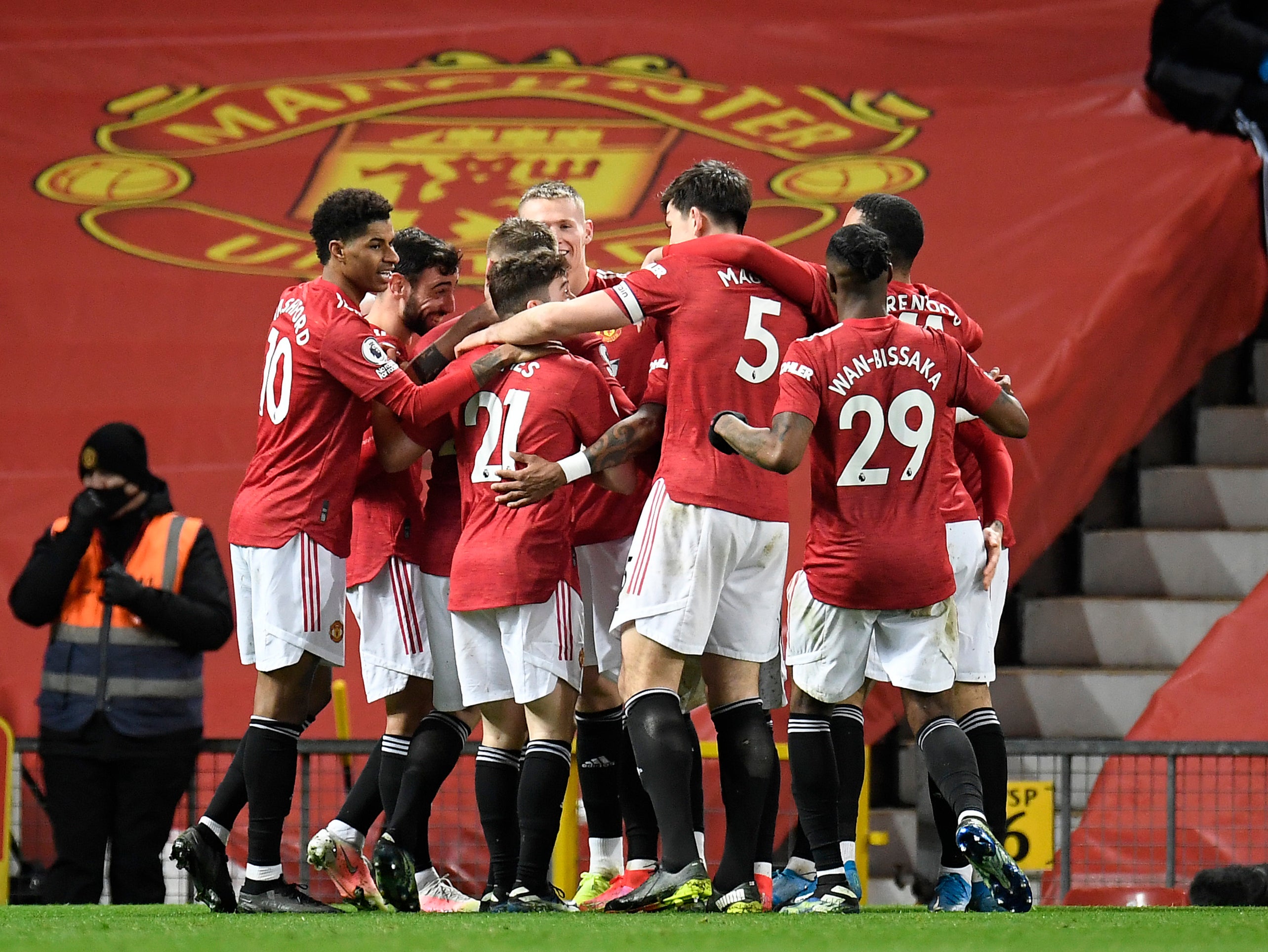 Manchester United’s players celebrate scoring against West Ham