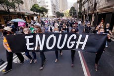 Australians rally at Parliament to demand justice for women