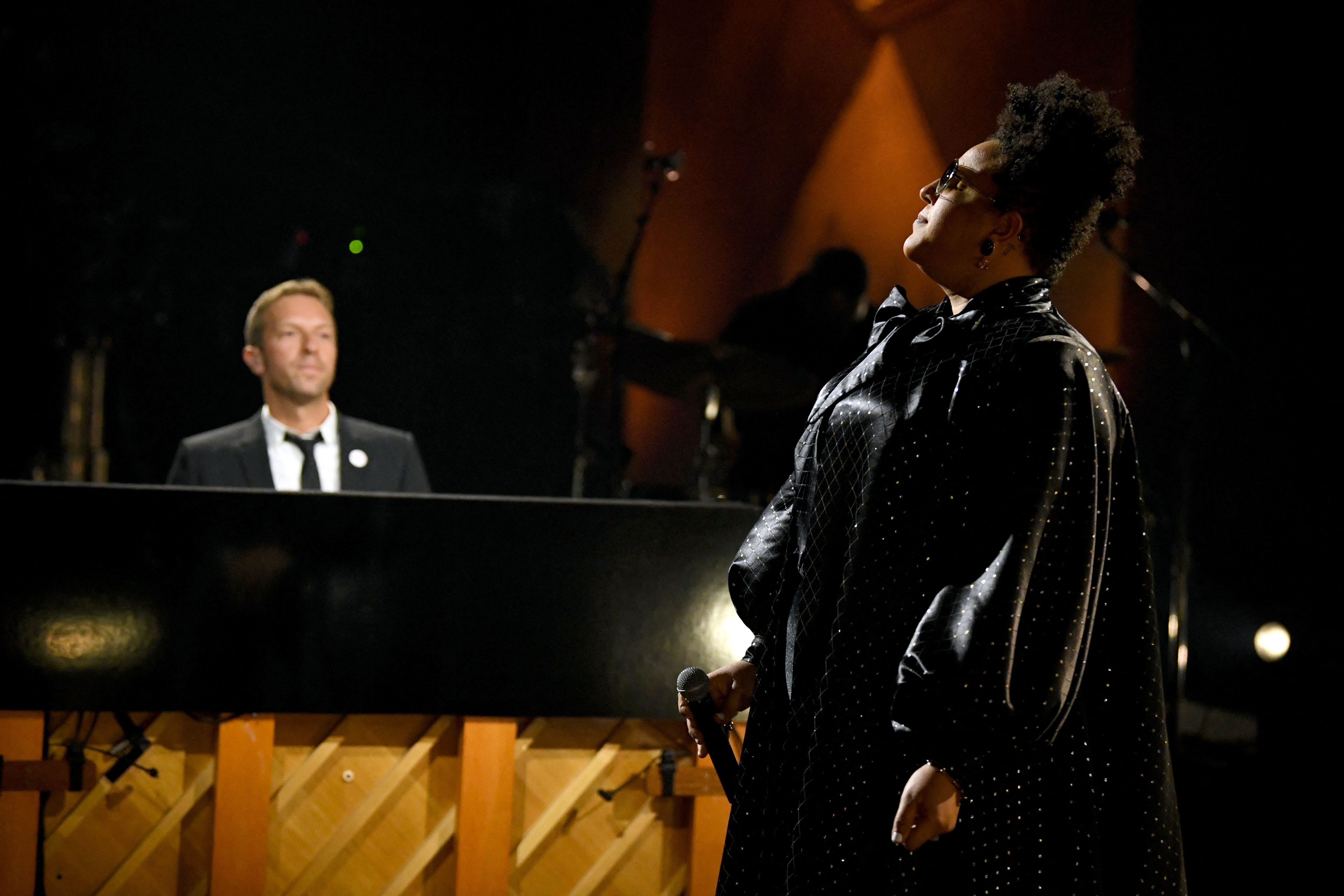 Brittany Howard performs with Chris Martin at the 2021 Grammy Awards