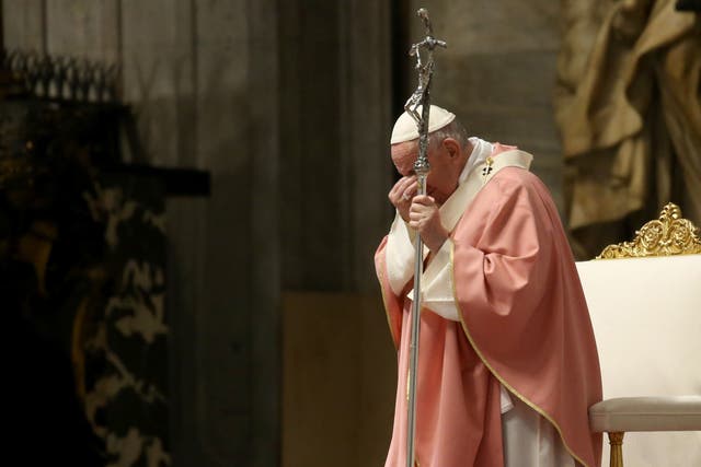 Pope Francis attends a mass in St Peter’s Basilica on Sunday in the Vatican