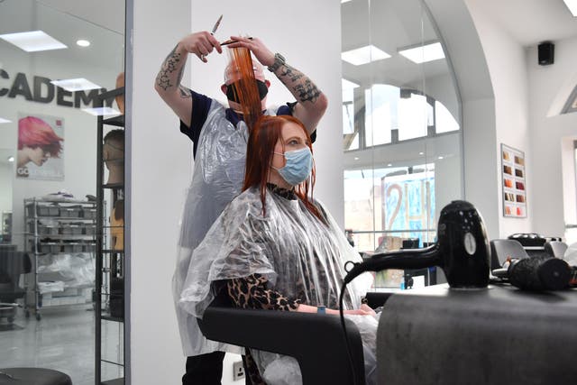 Hairdresses and barbers have been able to welcome their first customers back in Wales for the first time this year