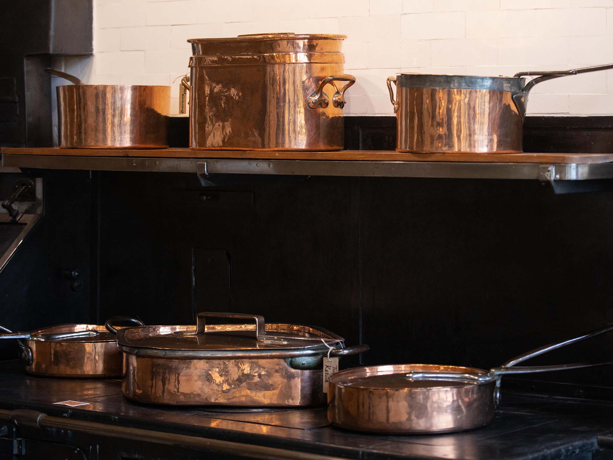 Copper pots on display in the kitchen