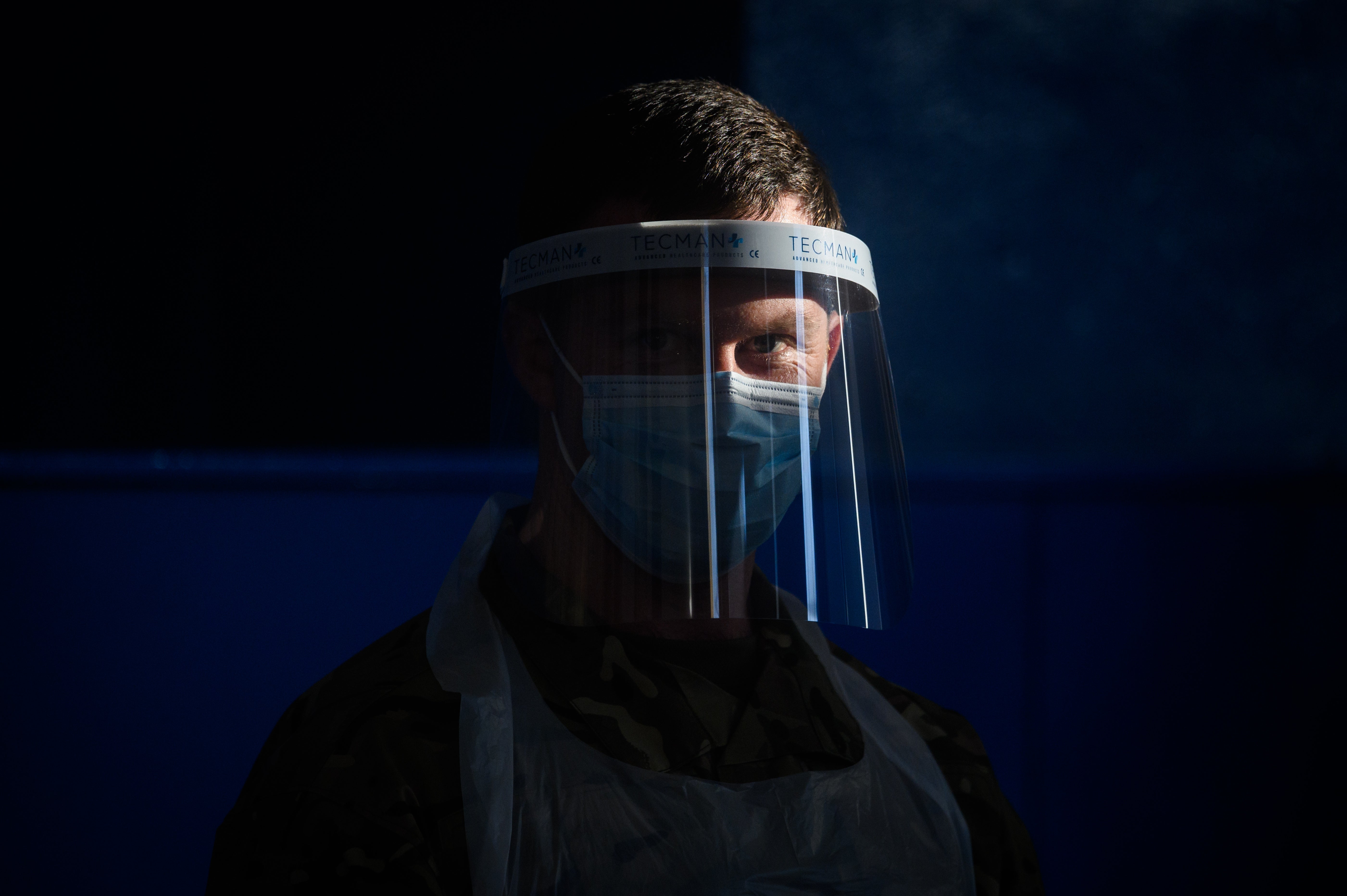 An RAF airman waits to assist more visitors at a temporary COVID-19 testing centre within The Engine House on November 25, 2020 in Merthyr Tydfil, Wales