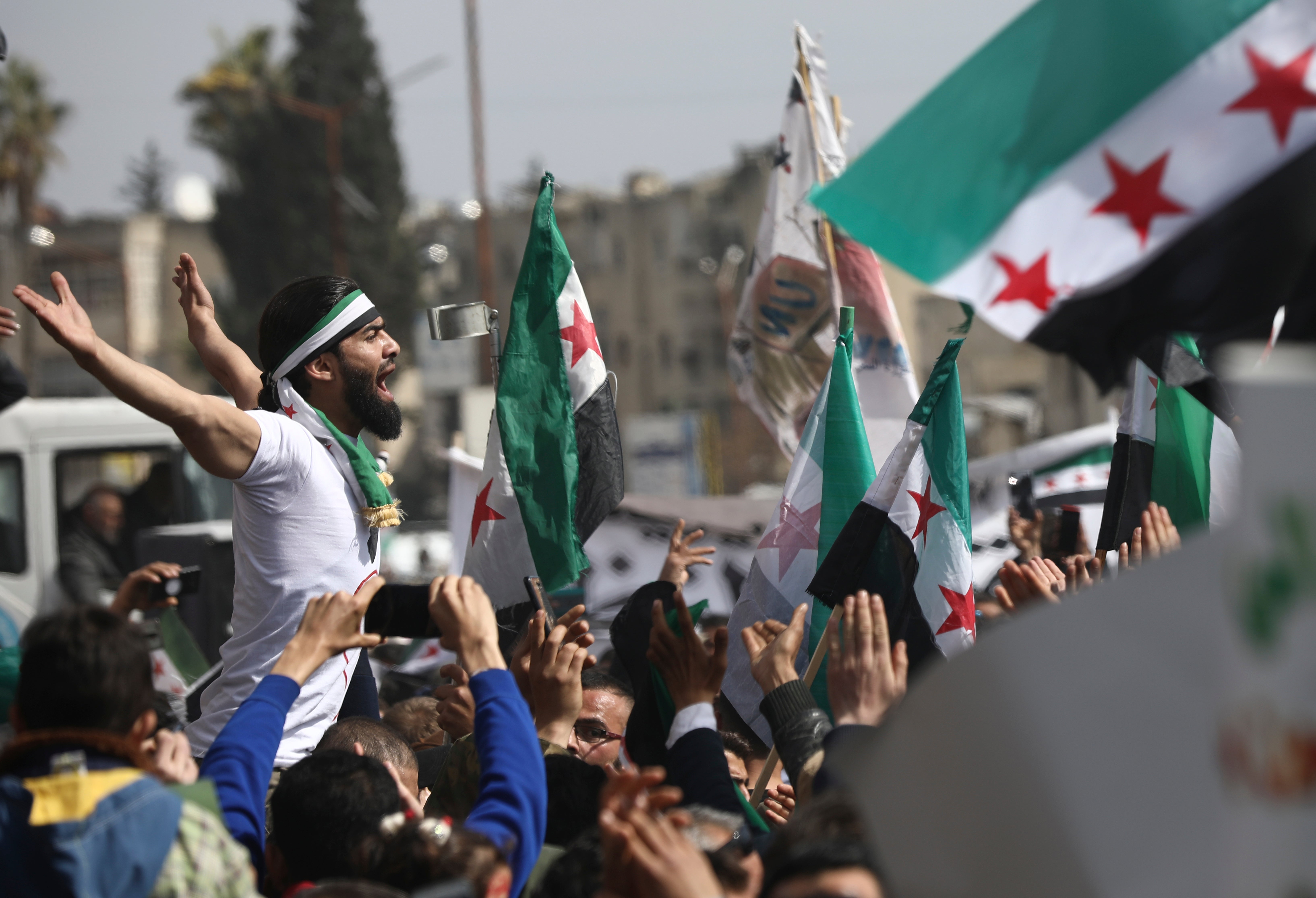 Anti-Syrian government protesters in Idlib mark 10 years since the start of a popular uprising against Assad