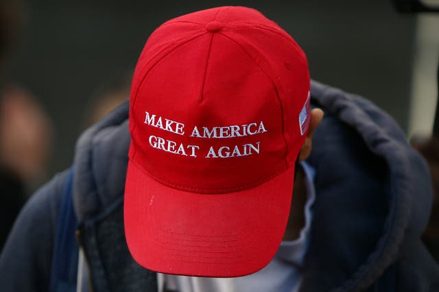 <p>The bright red hats were created by Donald Trump for his presidential run (File photo)</p>