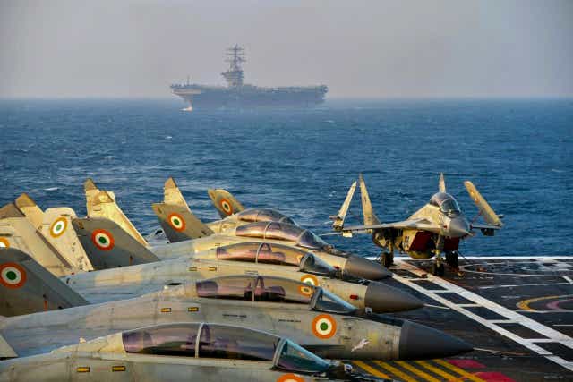 Indian army fighter jets on the deck of an aircraft carrier during an exercise last November
