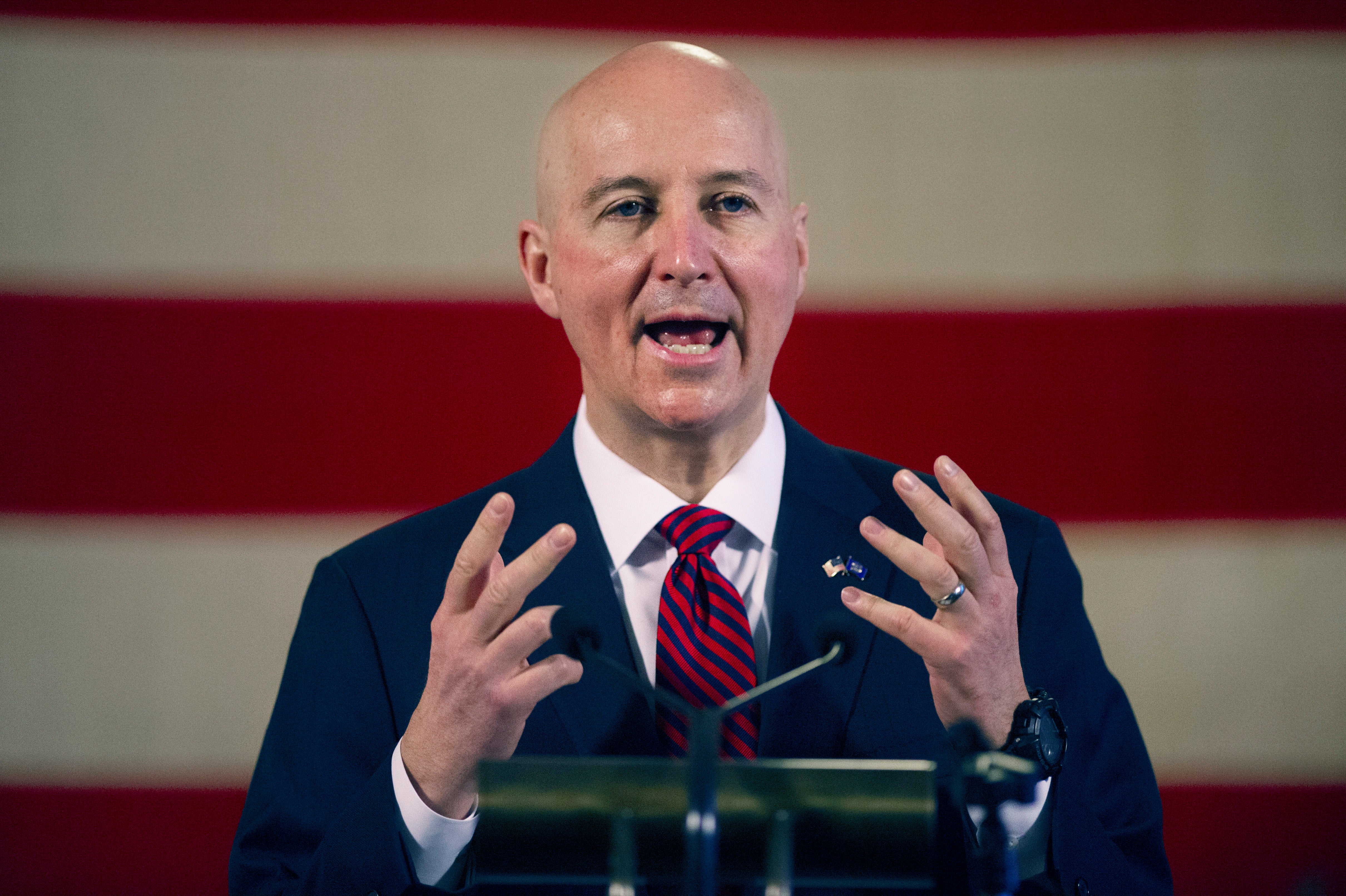File: Nebraska Governor Pete Ricketts speaks during a news conference in February