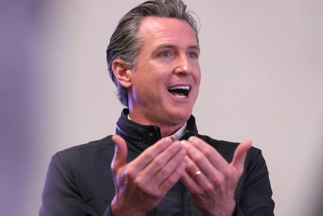 <p>California Gov. Gavin Newsom speaks to the media during a visit to a mobile COVID-19 vaccination center on March 10, 2021 in South Gate, California. </p>