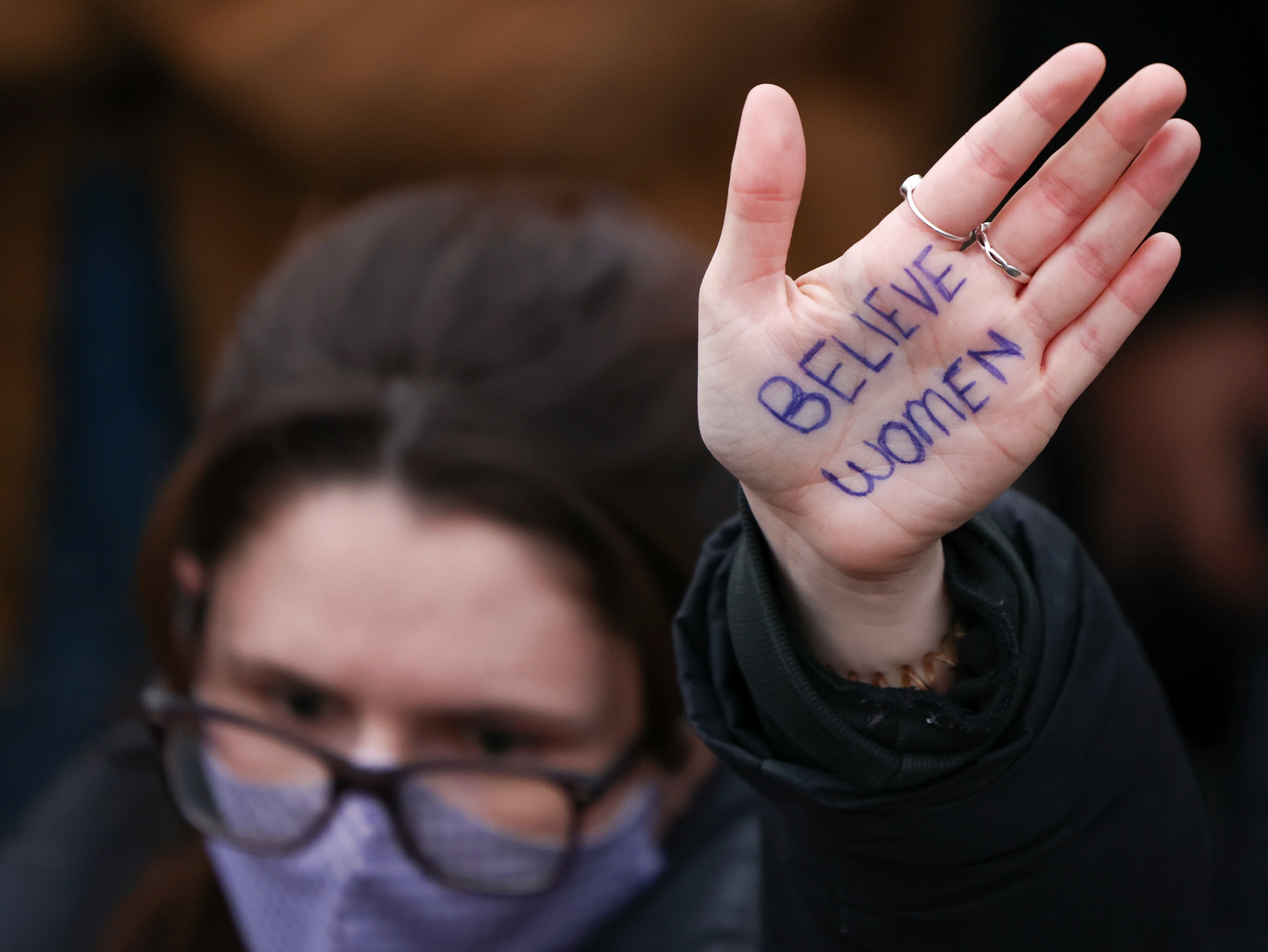 A woman has a simple but powerful message written on her hand during the Parliament Square protests. It is a call to authorities and others to believe victims when they say they have be subjected to sexual assault or harrassment. It is also closely linked to the #MeToo movement when it fell into widespread use.