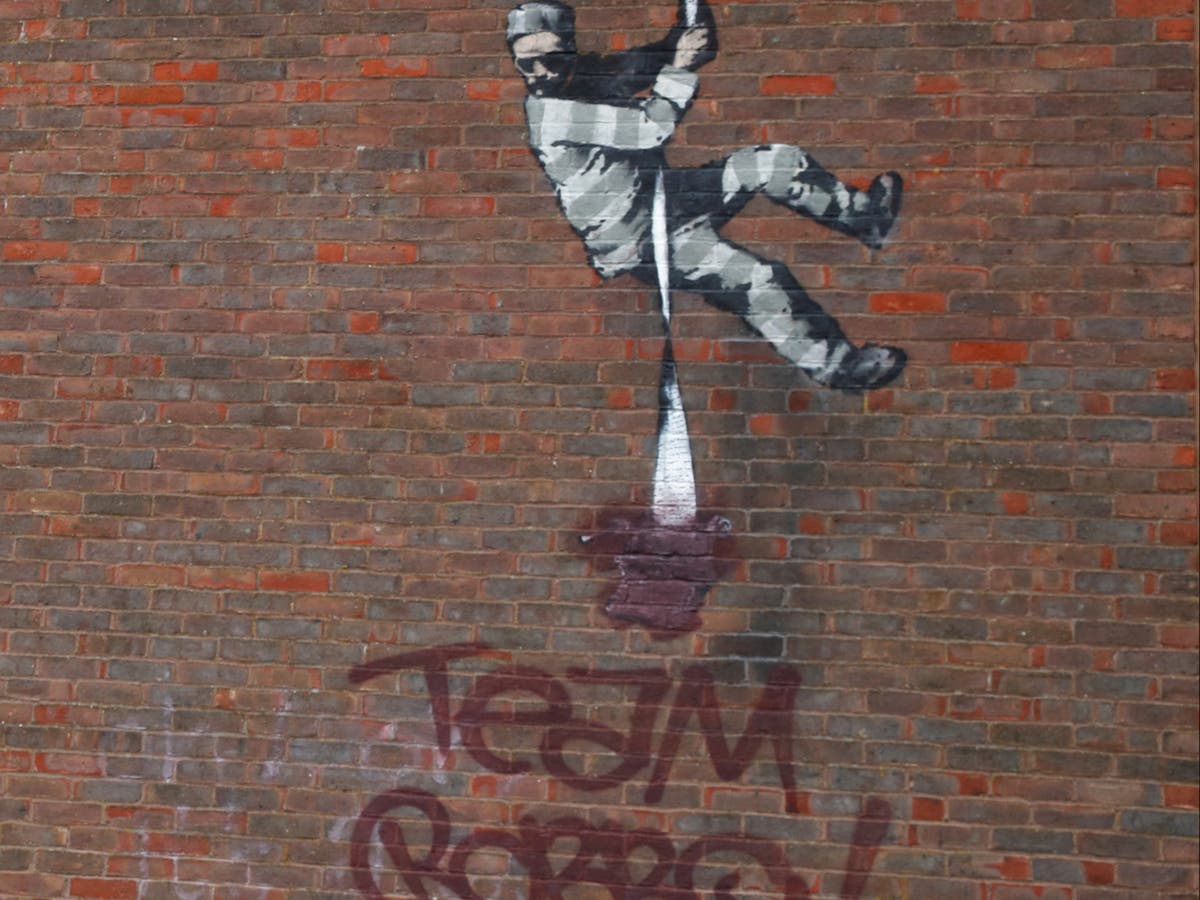 Banksy: Reading prison artwork vandalised with name of rival | The ...