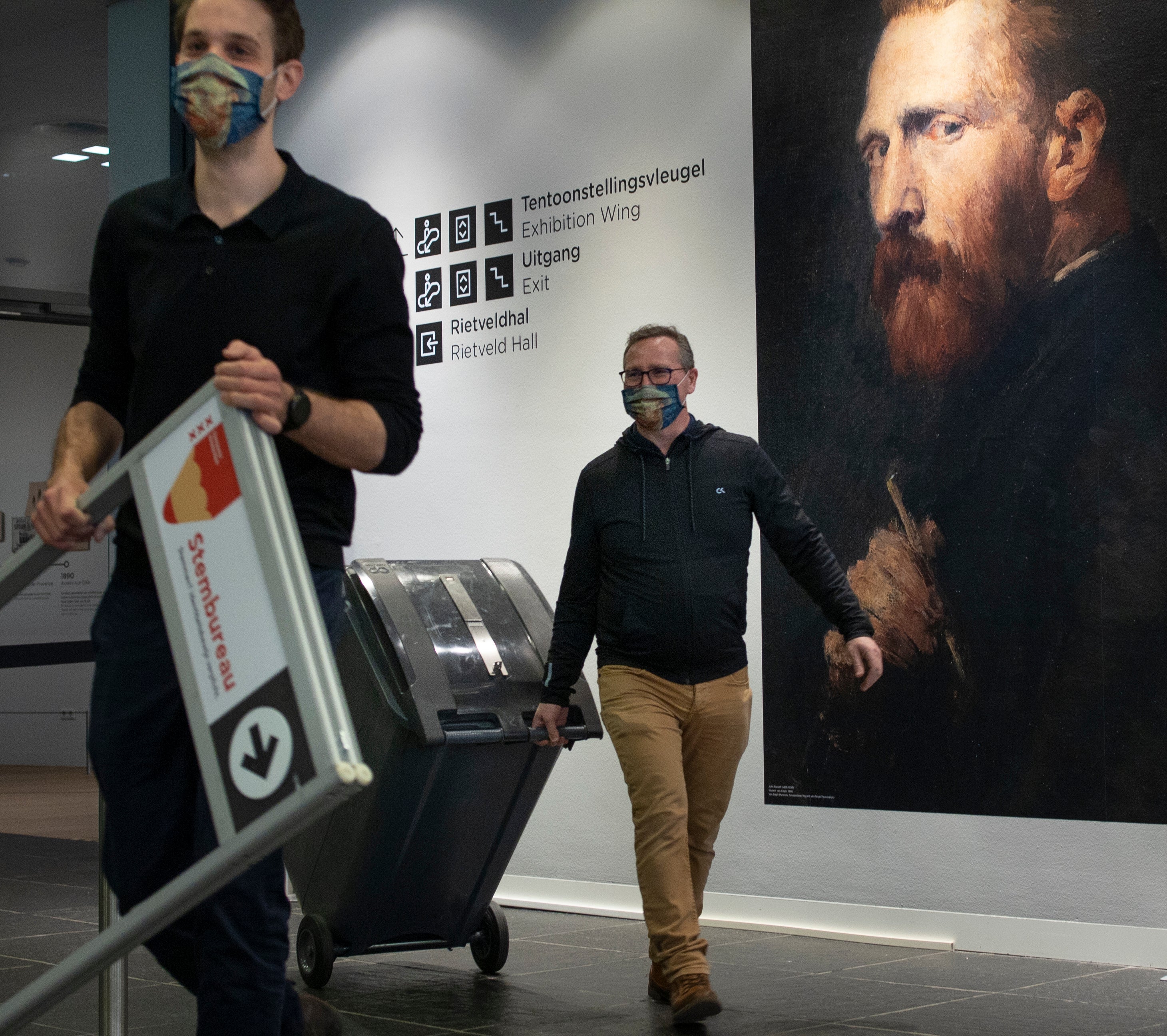 A ballot box is brought to a polling station inside the Van Gogh museum in Amsterdam