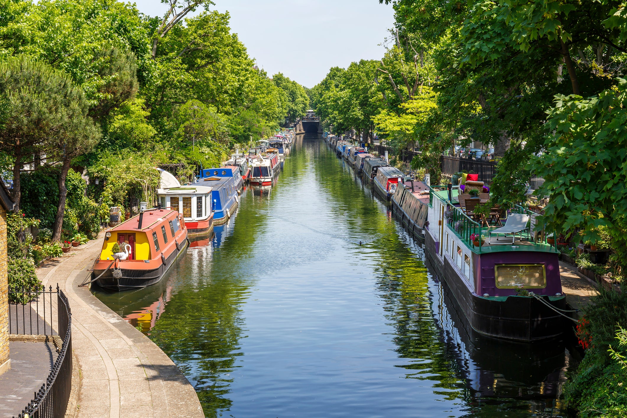 Narrow boats moored at Regent’s Canal in Little Venice, London