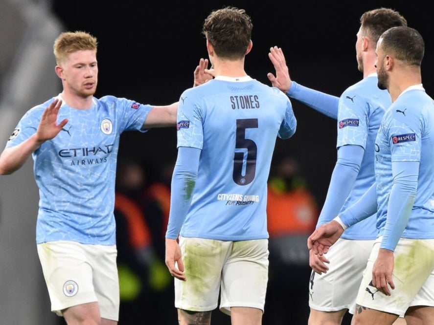 Man City’s players celebrate at full-time