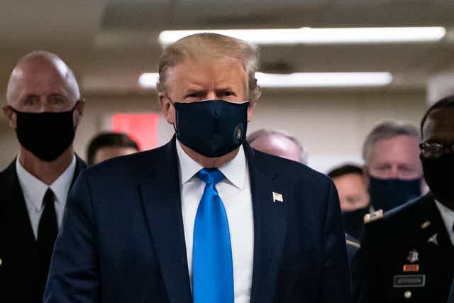 <p>US President Donald Trump wears a mask as he visits Walter Reed National Military Medical Center in Bethesda, Maryland' on July 11, 2020. (Photo by ALEX EDELMAN / AFP) </p>