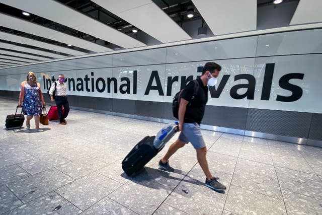 Passengers in the arrivals hall at Heathrow Airport in August 2020